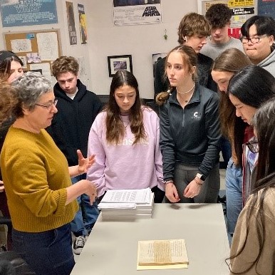 Students listen to Connecticut author and Yale University graduate Daphne Geismar share thoughts and stories from her work Invisible Years, which details the experiences of her family members during the Holocaust. 
